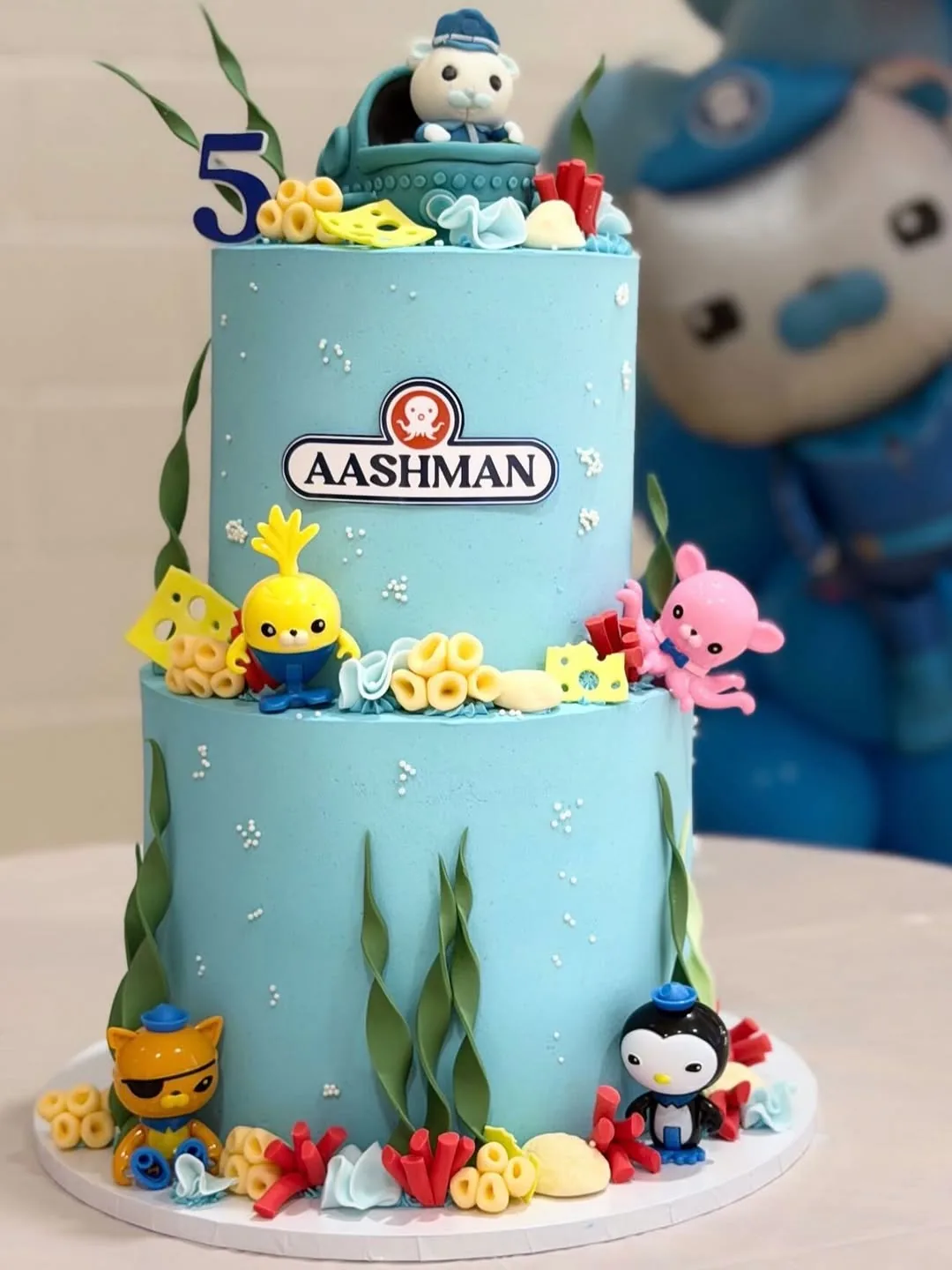 An Octonauts themed tiered birthday cake